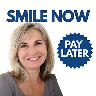 Smiling couple after successful dental treatment