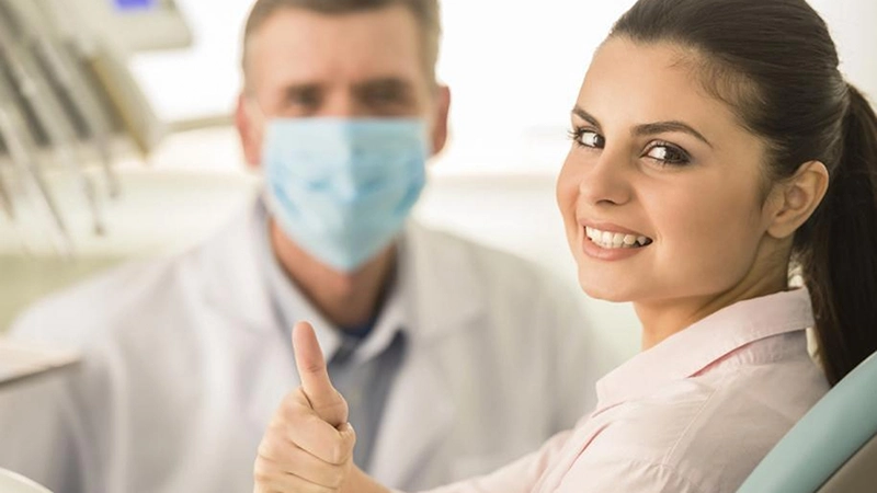 Happy couple with dental implants